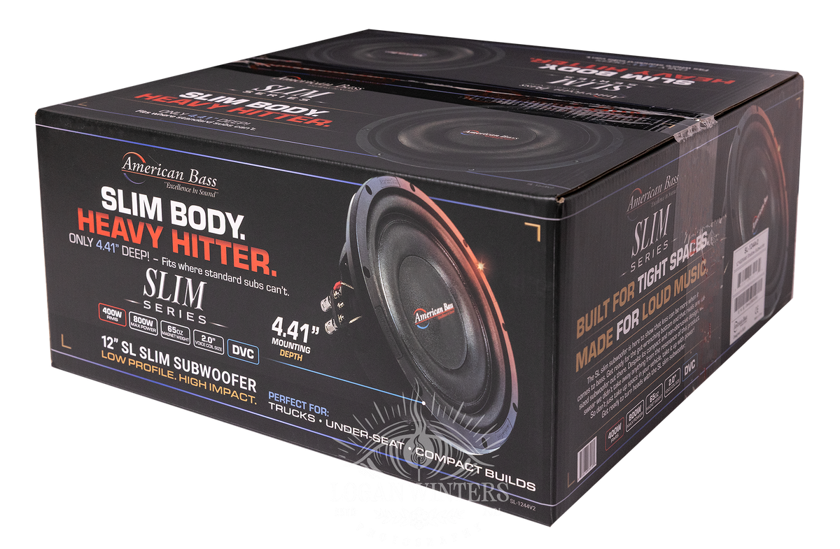 Packaging for the American Bass SL 12″ Car Subwoofer (300 Watts RMS, Single Voice Coil 4 Ohm, Shallow Mount) showcases dynamic images of the slim profile subwoofer and highlights features such as “Slim Body. Heavy Hitter.” The design emphasizes its ultra-shallow 4.41″ mounting depth—making it perfect for trucks and compact car builds—giving customers a clear view of this powerful yet space-saving car audio solution.