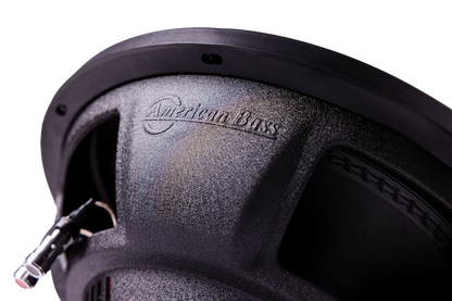 Close-up of an American Bass Audio DX 12" subwoofer from the Ground Pound Bundle, featuring the brand name embossed on its textured surface, visible wiring, and intricate speaker detailing—an ideal match for a setup with dual 12" subwoofers and the VFL Rebel REBEL-3000.1 monoblock amplifier.