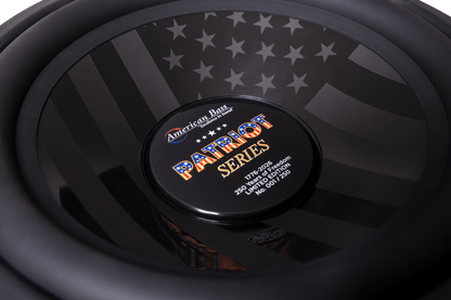 Close-up of the American Bass Patriot Series Limited 250 Edition Subwoofer, showcasing its black and gray American flag design, labeled 250 watts, 4 ohm, and individually numbered as #61 of only 120 produced.