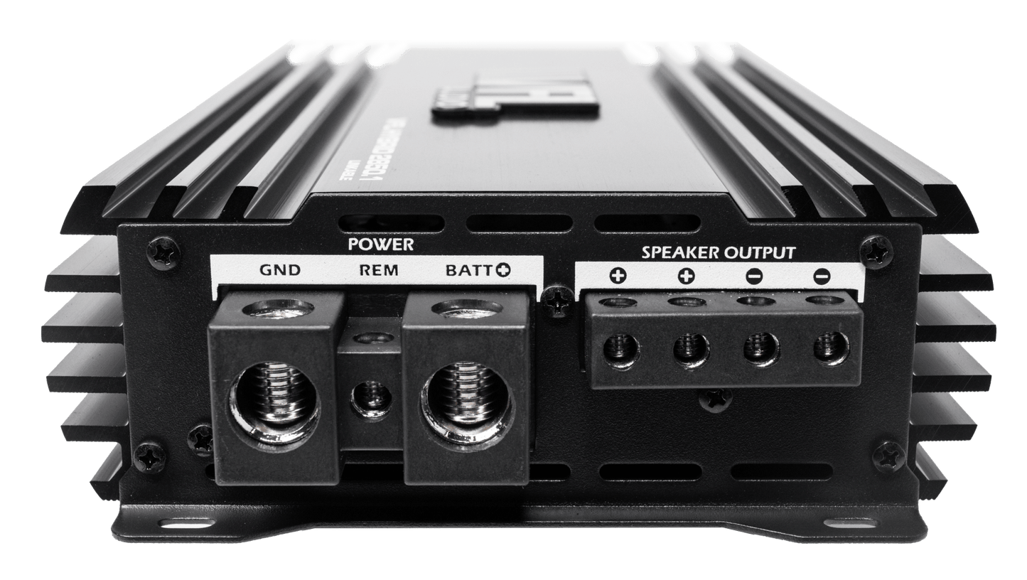 A close-up of the VFL Hybrid 2850.1 Class D Digital Monoblock Amplifier shows labeled power (GND, REM, BATT) and speaker outputs on a white background—ideal for any modern car audio system.